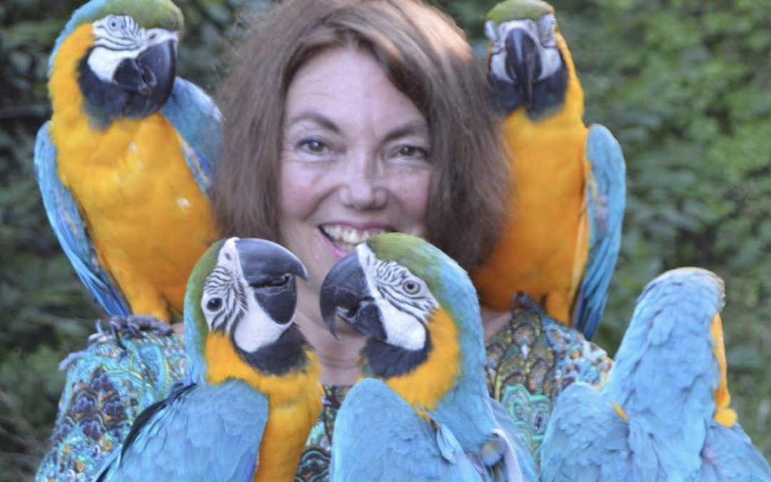 Gloria Waslyn with her Parrots for Peace family